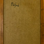 The back of the painting "Abstract Composition" by Nejad Devrim, showing the canvas structure and the artist's handwritten signature.