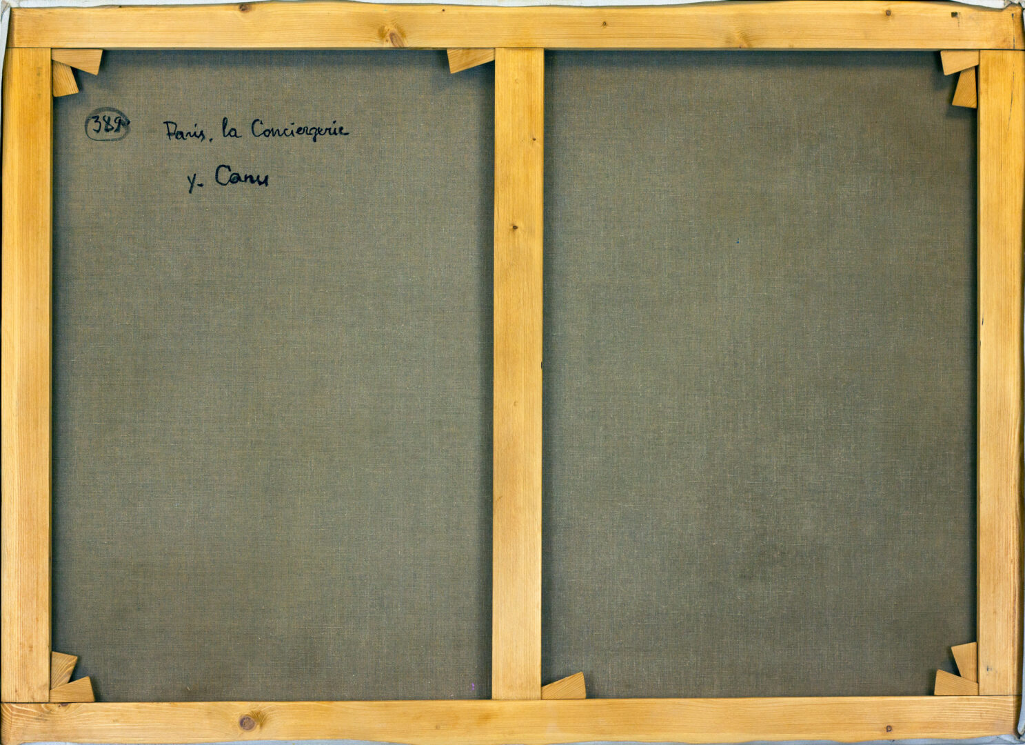 Back of "Paris la Conciergerie" by Yvonne Canu, showing the canvas structure and condition of this collectible artwork.