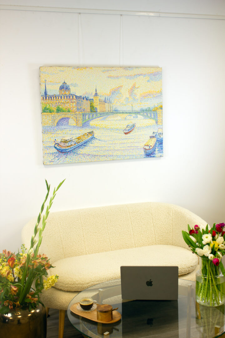 "Paris la Conciergerie" by Yvonne Canu in an interior setting, illustrating how this framed Pointillist artwork enhances a space with Parisian elegance.