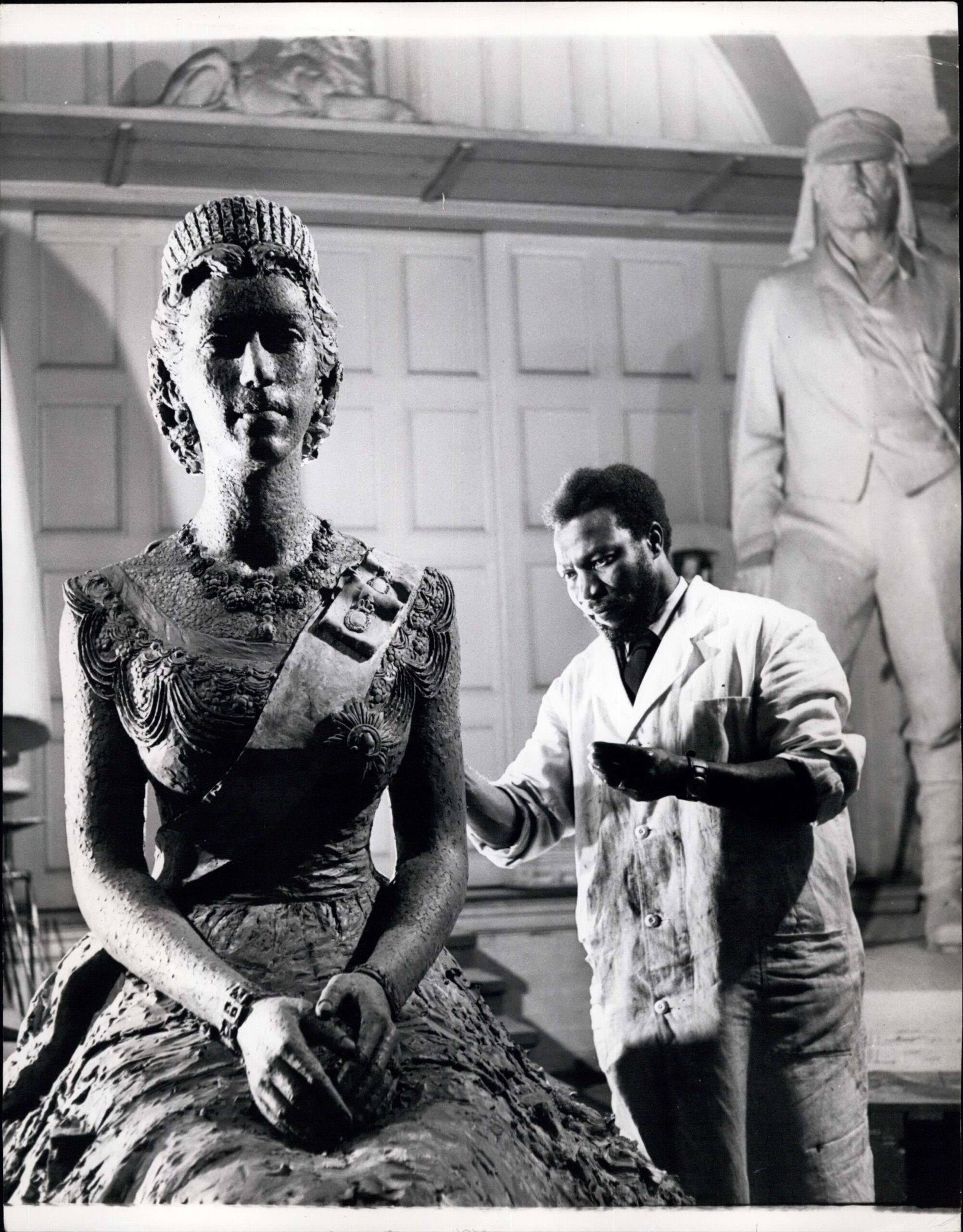 Ben Enwonwu sculpting the portrait of Queen Elizabeth II in his studio, 1956 — the first royal commission awarded to an African artist.