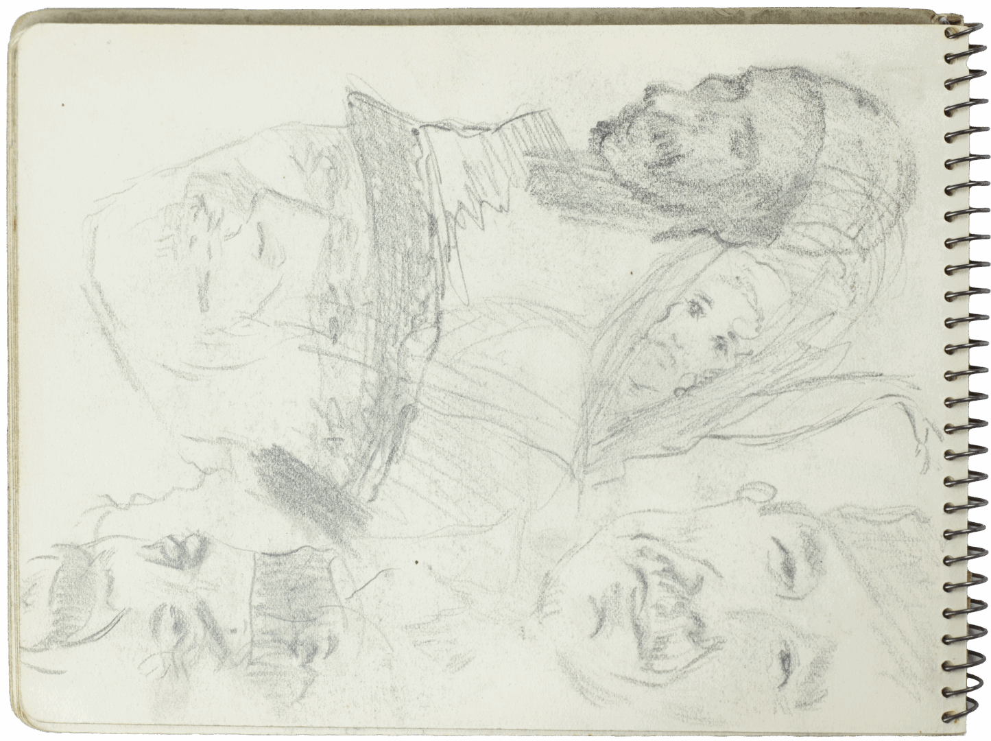 Sketchbook page with multiple head sketches and a draped central figure by Mariano Bertuchi.