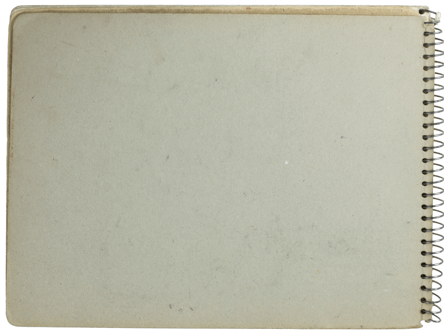 Plain cardboard back cover of a vintage spiral-bound sketchbook.