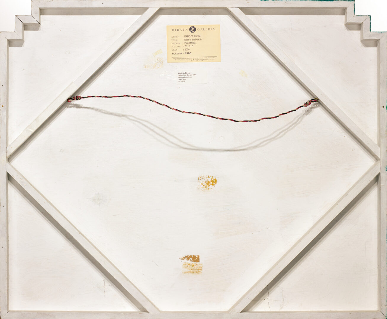 Back of Mario De Rivera’s Ruler of the Domain with gallery labels and stretcher support visible.