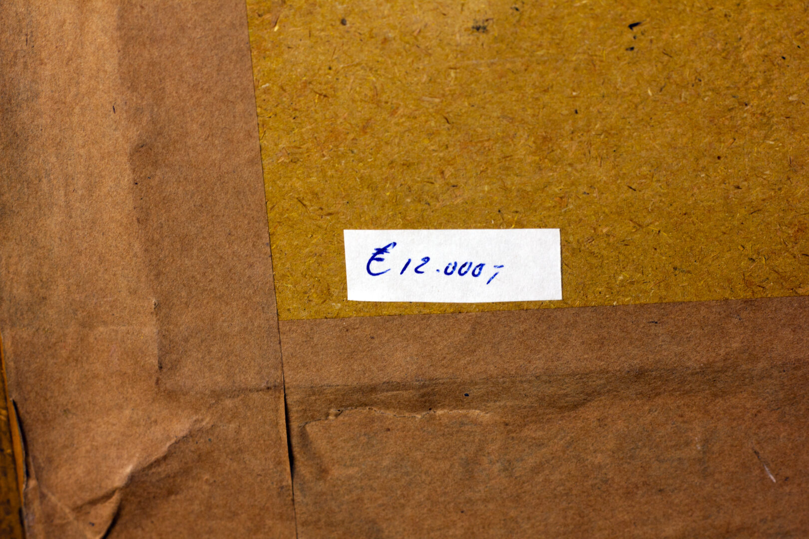 Historic price label showing €12.000 on the back of Georges Scott’s The Sabre Dance