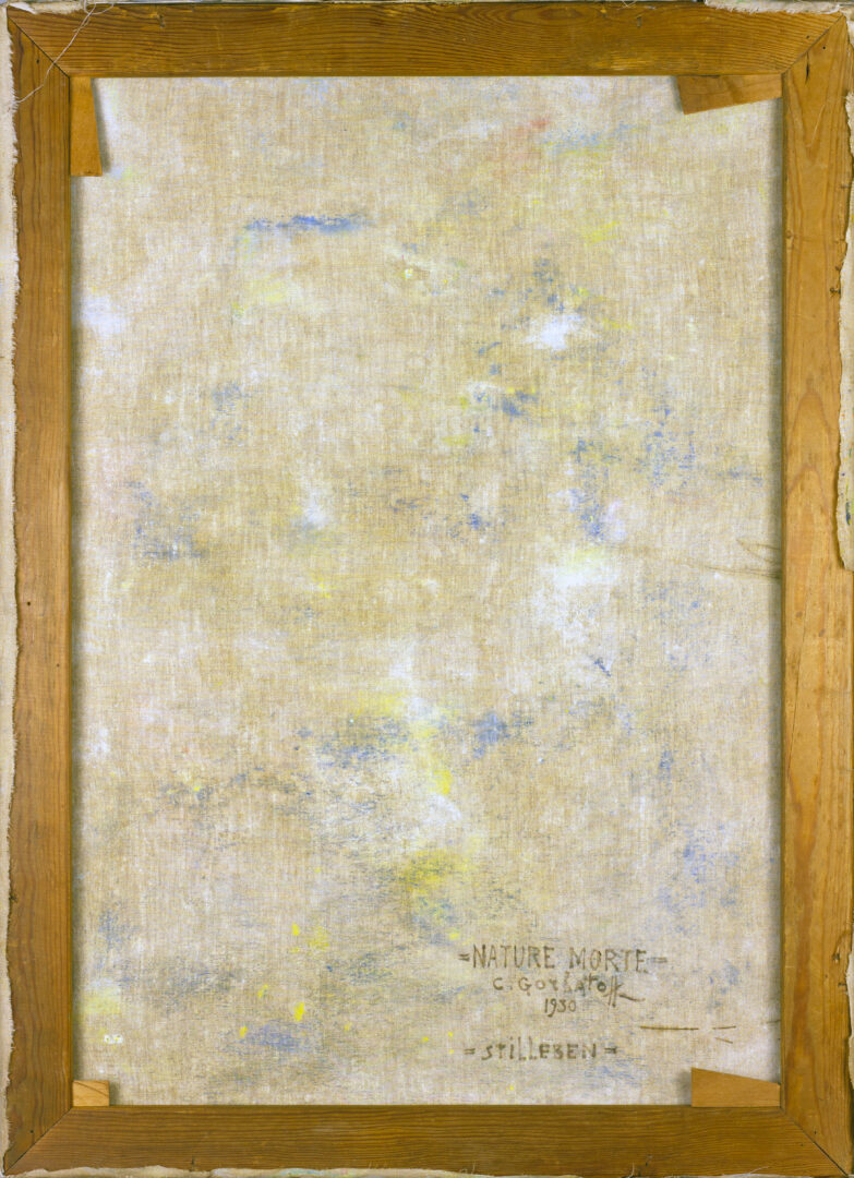 Full view of the back of Still Life with Pumpkins and Geraniums (1930), showing the canvas stretcher and artist’s handwritten inscription.