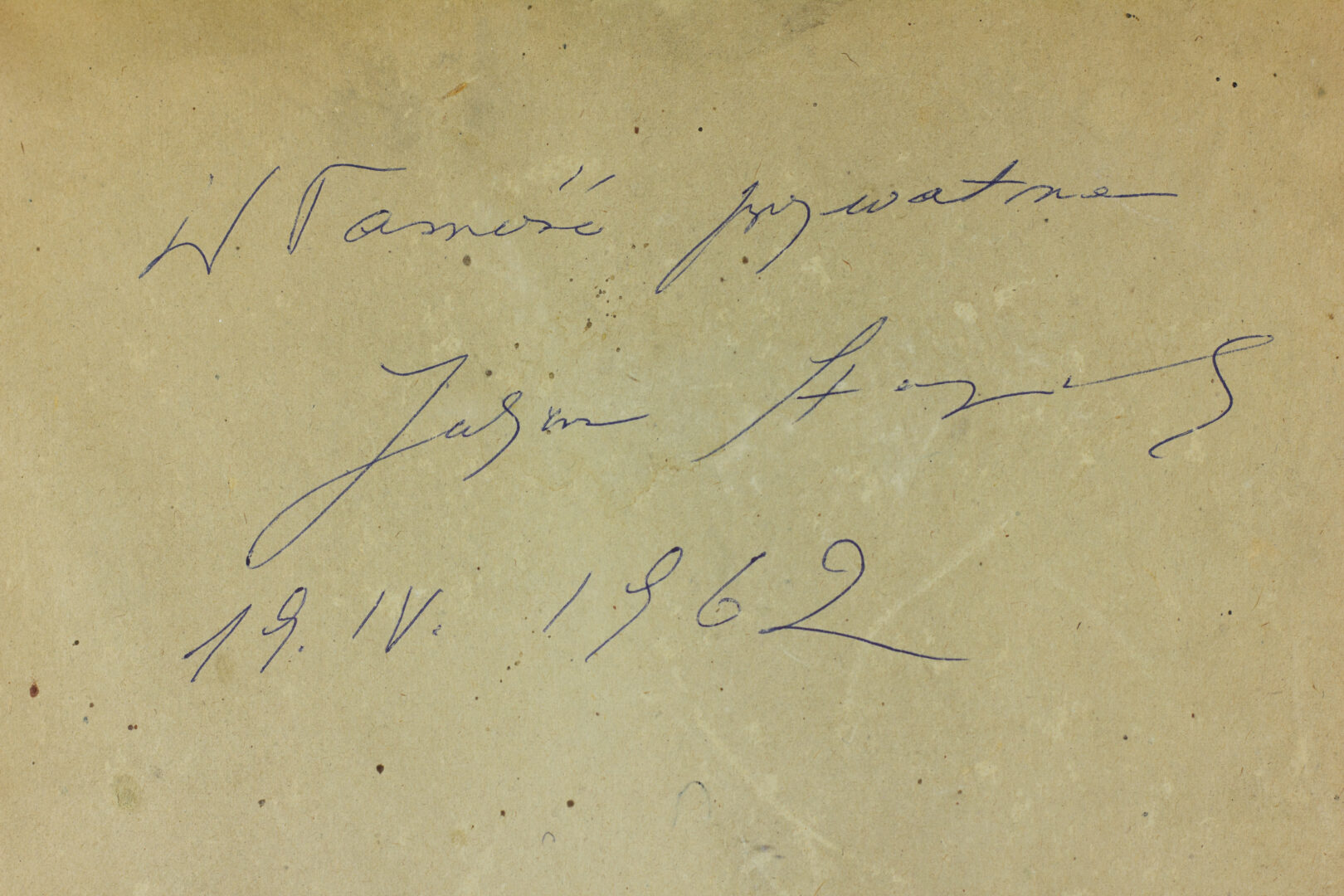 Back of the painting featuring a handwritten Polish dedication in blue ink, dated April 19, 1962.