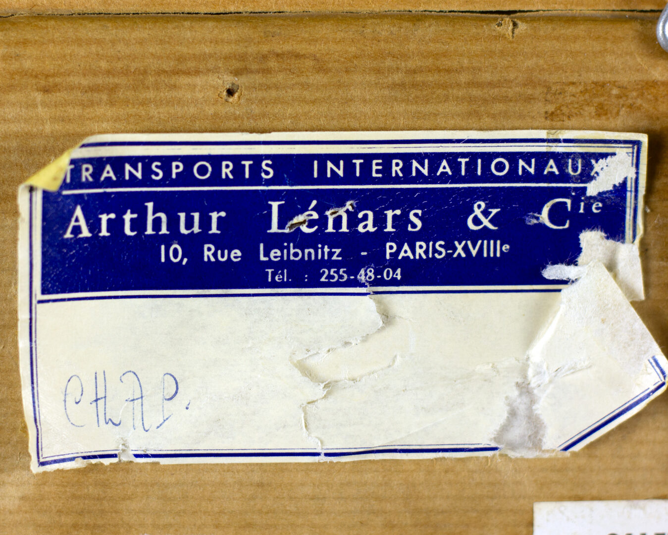 Close-up of an authentication or cataloguing label on the verso.