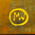 Monogram “MW” in yellow on the front of Jungle by Mariola Wroblewski.