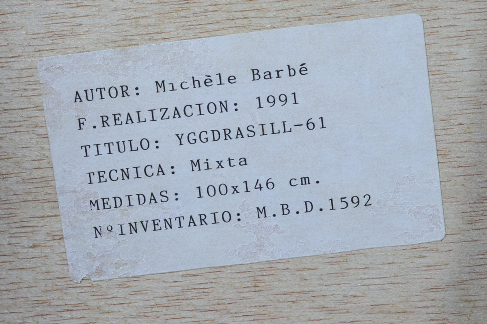 Inventory label with artist, title, year, technique, and size
