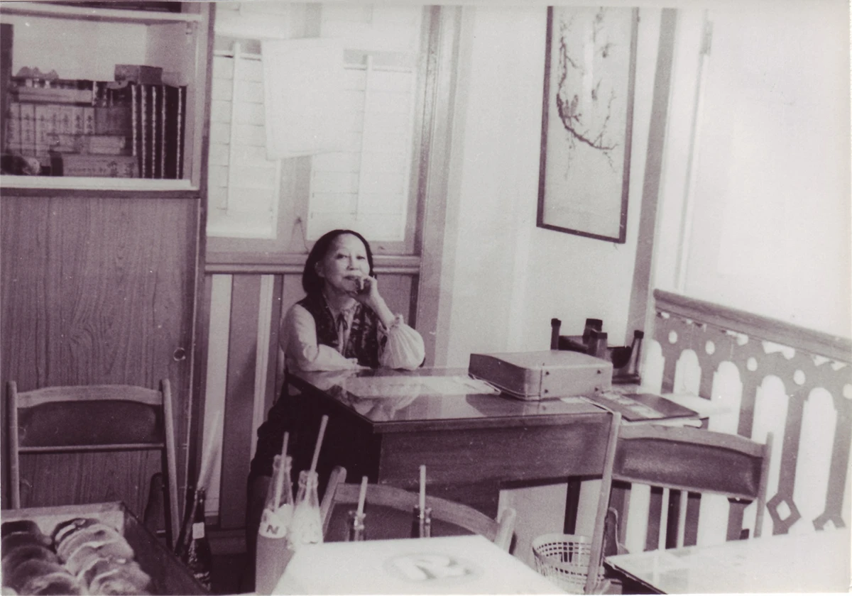 Georgette Chen in the staffroom at the Nanyang Academy of Fine Arts, c. 1970s. | Aurora & Athena Auction House Georgette Chen in the staffroom at the Nanyang Academy of Fine Arts, c. 1970s.
