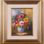 Floral still life oil painting in a decorative frame