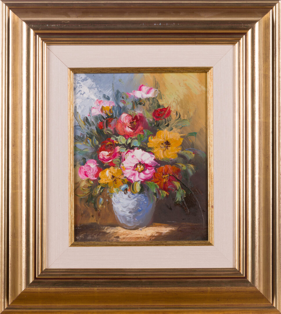 Floral still life oil painting in a decorative frame