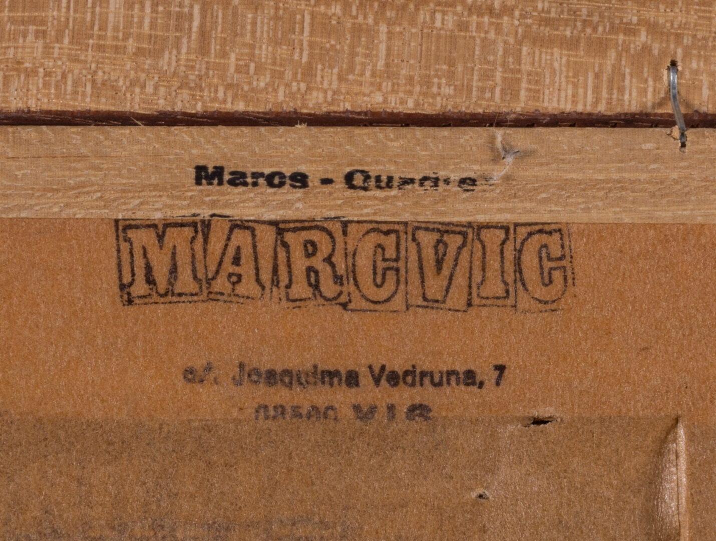 Detail of the framer's stamp on the back