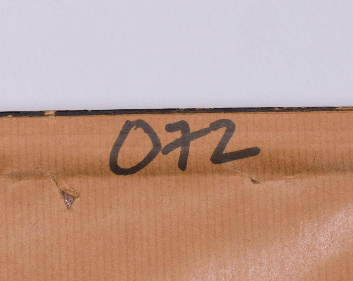 Detail of the framing label on the back