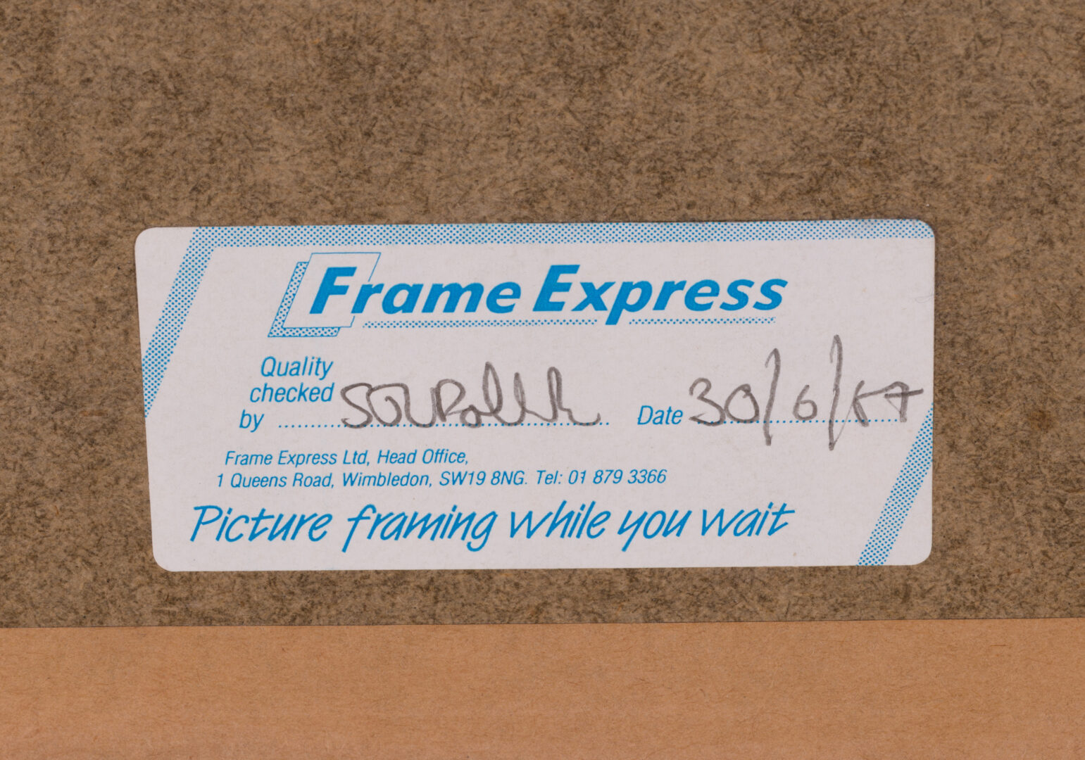 Detail of the framing label on the back