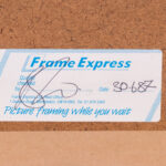 Detail of the framing label on the back