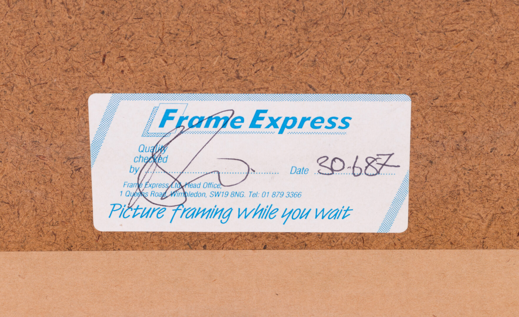 Detail of the framing label on the back