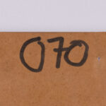 Detail of the numbering on the back of the lithograph