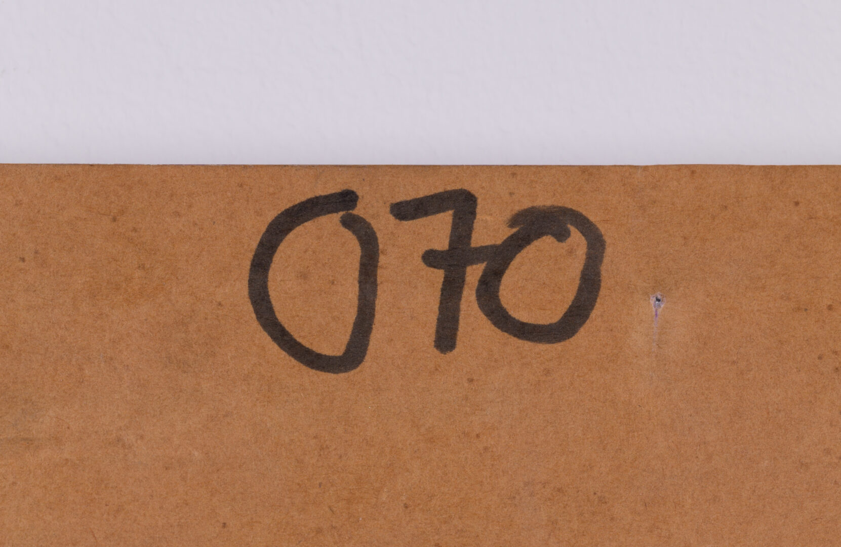 Detail of the numbering on the back of the lithograph