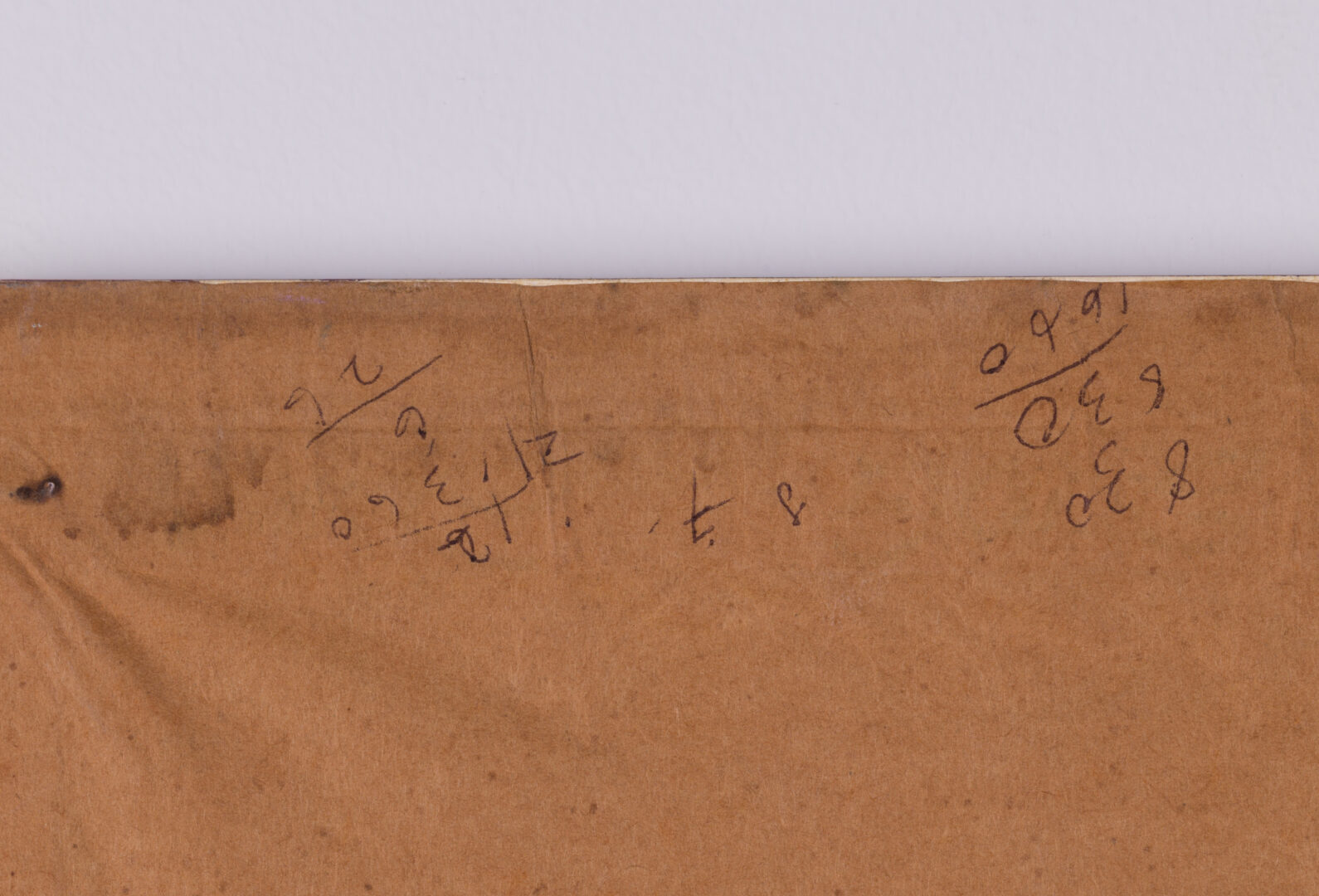 Detail of the handwritten calculations on the back of the frame