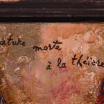 Detail of the title and date "75" on the painting