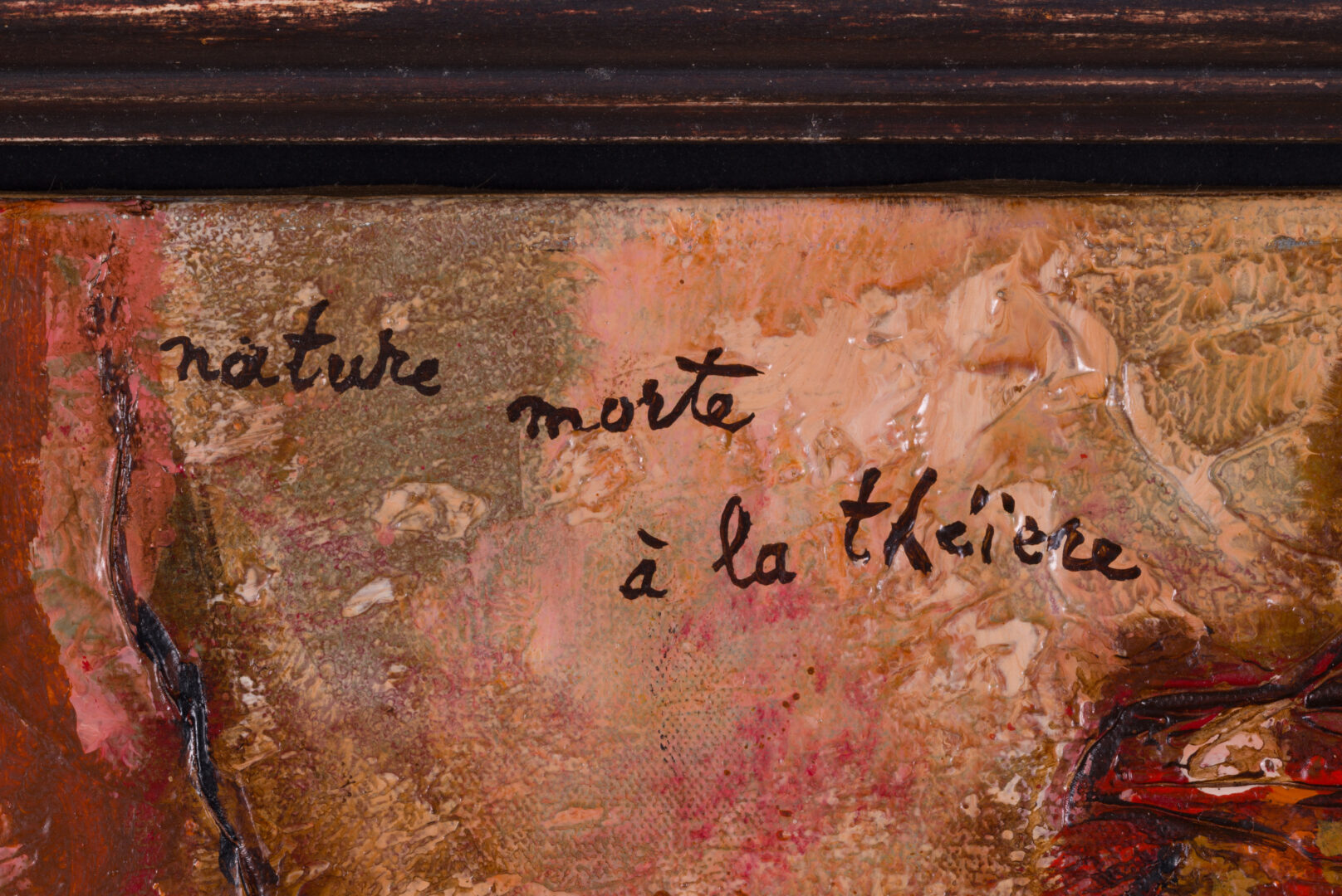Detail of the title and date "75" on the painting