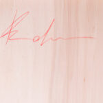 Detail of the artist's signature on the back