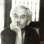 Portrait of the renowned expressionist artist Théo Tobiasse, whose original masterpieces are for sale at Aurora & Athena gallery