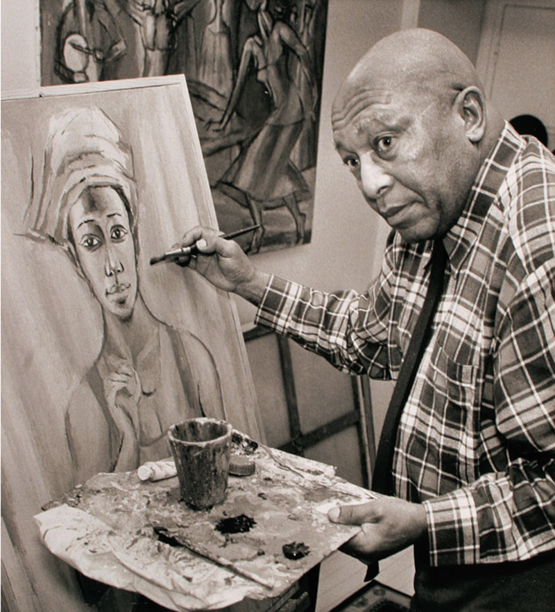 Fotografía de archivo del artista Gerard Sekoto pintando en su estudio. | Aurora & Athena Archival photograph of artist Gerard Sekoto painting in his studio.